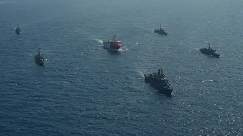 Reuters Oruc Reis is escorted by Turkish Navy ships as it sets sail in the Mediterranean Sea, off Antalya, Turkey, August 10, 2020