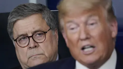 Getty Images Bill Barr and Donald Trump