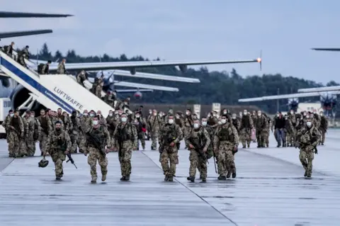 Getty Images German troops return home after pullout last week