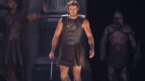 Paramount Paul Mescal in Gladiator II, pictured with a sword in the Colosseum