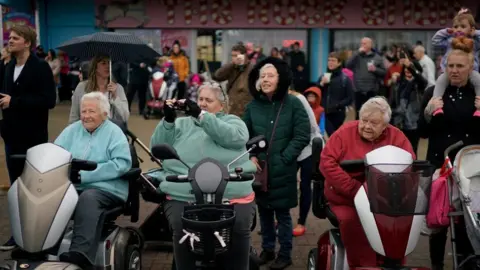 Getty Images people watch on new brighton