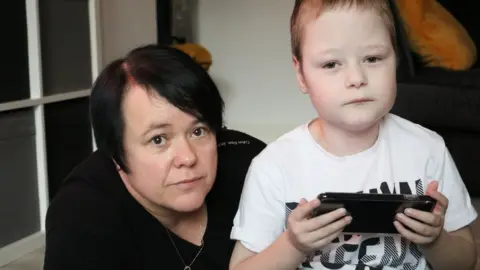 Lisa Broom and her son Kayden