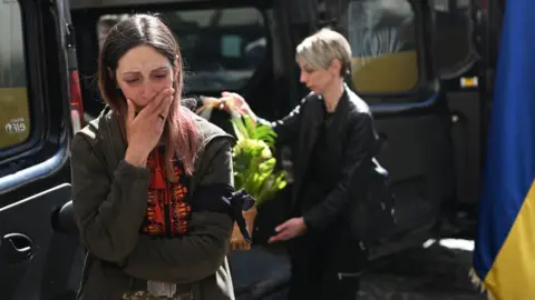 Getty Images A funeral is held for a Ukrainian soldier in Lviv on Tuesday