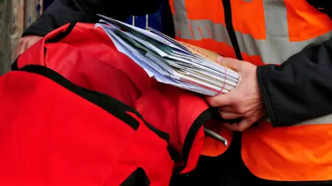 PA Media Postal worker