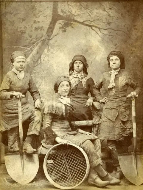 Herbert Wragg Pit Brow lasses from an unknown colliery in Wigan, Lancashire, 1887.