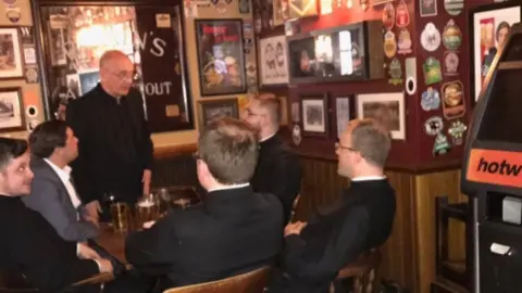 @j_jlloyd / Twitter Priests in pub