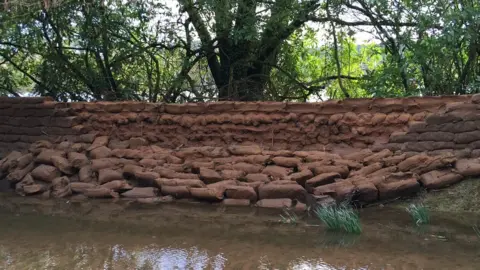 Gwydir Castle A breached sandbag wall