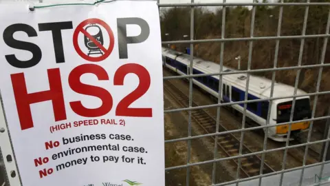 Reuters Stop HS2 sign on a railway bridge