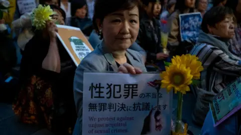 Getty Images Protesters gather at the rally in 2019 to criticize recent acquittals in court cases of alleged rape in Japan