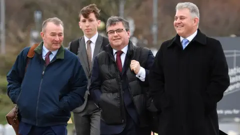 Getty Images Simon Hart, Robert Buckland and Brandon Lewis