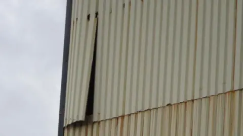 Environment Agency Cladding pulling away from the wall at one building on site