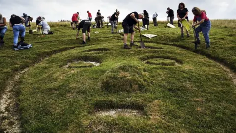 John Millar / National Trust Work on the Cerne Abbas giant 2019