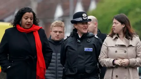 Reuters Liverpool Mayor Joanne Anderson, Merseyside Police Chief Constable Serena Kennedy, and Merseyside Police and Crime Commissioner (PCC) Emily Spurrell