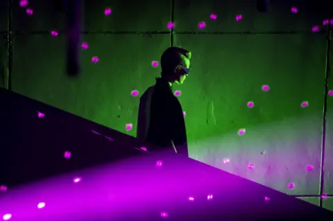 ETIENNE LAURENT/ EPA A model presents a creation from the Spring/Summer 2019 Women's collection.