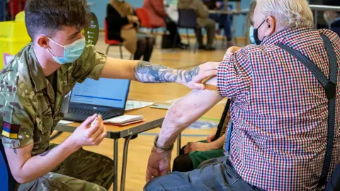 UK government Vaccine being given