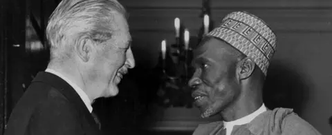 Getty Images Nigerian politician Abubakar Tafawa Balewa meeting British Prim Minister Harold Macmillan at Admiralty House, London, September 6th 1962