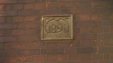 Date plaque on the Kettering Bed Centre building