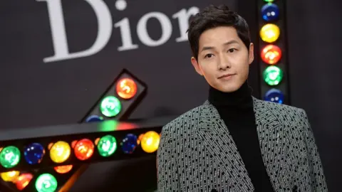 Francois Durand JANUARY 20: Song Joong-ki attends Dior Homme Menswear Fall/Winter 2018-2019 show as part of Paris Fashion Week at Grand Palais on January 20, 2018 in Paris, France