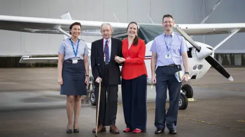SWNS Flying officer Chloe McFarlane with George Harvey, Claire Nias and flight lieutenant Ian Bright