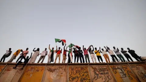 Getty Images Sudanese protesters gather outside the army headquarters in Khartoum on May 6, 2019.