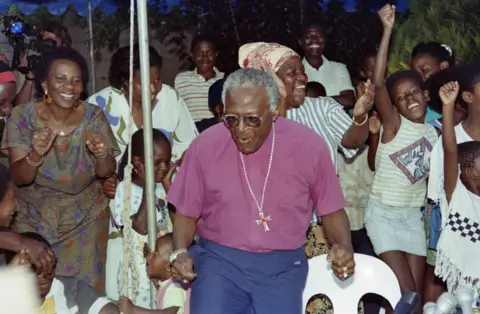 AFP South African activist and Nobel Peace Prize and Anglican Archbishop Desmond Tutu reacts at announcement of the freedom of the anti-apartheid leader and African National Congress (ANC) member Nelson Mandela, on February 10, 1990 at his home in Soweto.