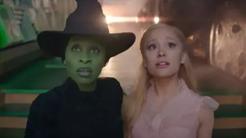 Cynthia Erivo as Elphaba with Ariana Grande as Glinda