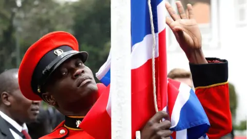 Reuters A soldier lowers the Union Jack at State House in Nairobi, Kenya - Thursday 30 August 2018