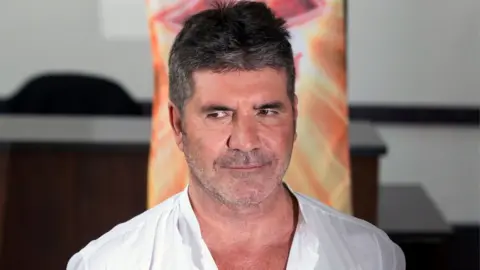 PA Simon Cowell