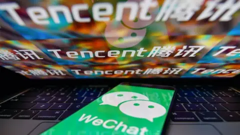 Getty Images Tencent has played down Donald Trump's ban on WeChat