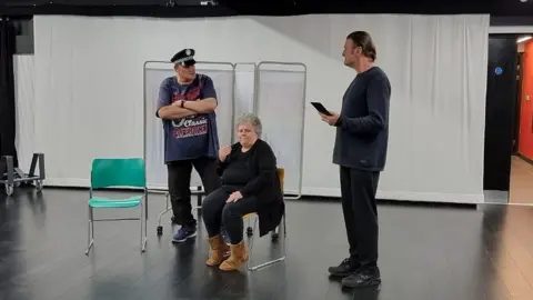 Clive and fellow actors