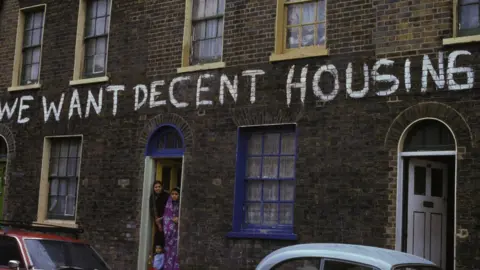 Jacob SUTTON Housing protest slogan