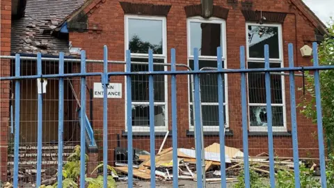 Local Democracy Reporting Service Demolition work on a disused school