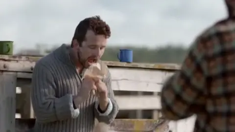 Rainbow Youth Nigel drop his pie on the Rainbow Youth advert