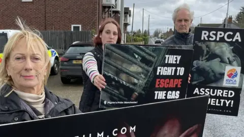 Alex Dunlop/BBC Protesters outside Cranswick Country Foods