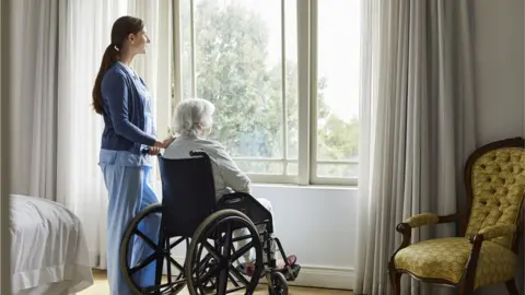 Getty Images care home generic wheelchair window