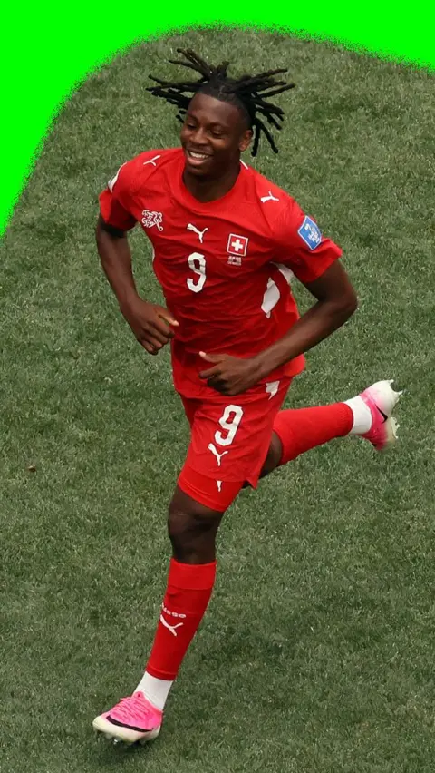 Johan Manzambi celebrates scoring for Switzerland against Bosnia-Herzegovina in the 2026 World Cup
