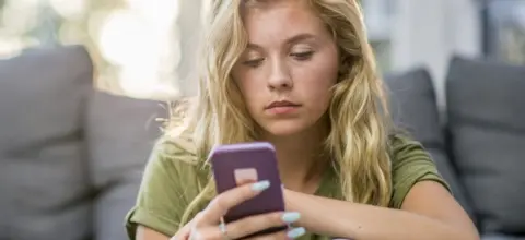 Getty Images Woman on smartphone