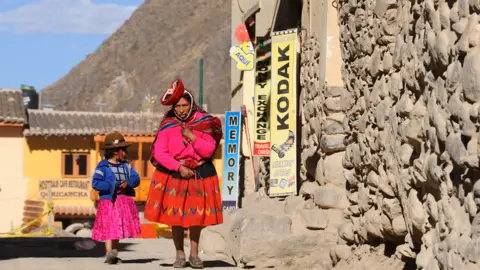 Frédéric Soltan/Corbis/Getty Images Quechua family, near Cusco, Peru