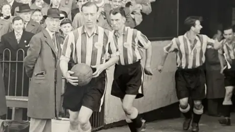 Contributed Bob Haugh (second out of the tunnel)