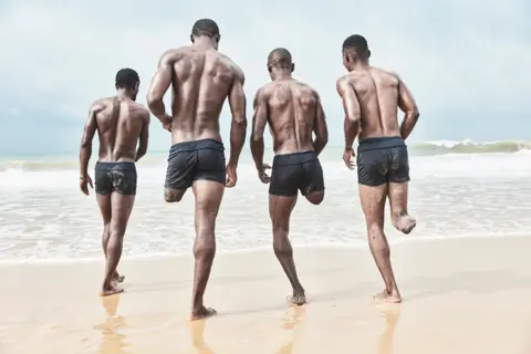 Jack Lawson / TPOTY.COM Nigeria's national amputee football team, the Special Eagles, training on the beach