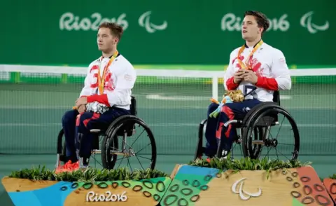 Getty Images (L-r) Silver medallist Alfie Hewett and gold medallist Gordon Reid of Great Britain at the medal ceremony for the Men's Singles Wheelchair Tennis at the Rio 2016 Paralympic Games