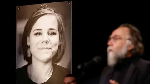 Reuters Russian political scientist and ideologue Alexander Dugin delivers a speech during a memorial service for his daughter Darya Dugina, who was killed in a car bomb attack, in Moscow