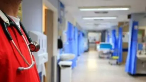 PA Doctor standing on hospital ward