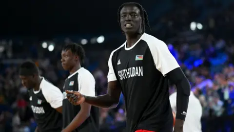 Morgan Hancock/Getty South Sudan basketball player Wenyen Gabriel and two others in Melbourne, Australia - Thursday 17 August 2023