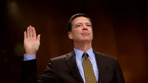 Getty Images Former FBI Director James Comey testifies before Congress.