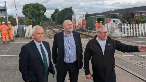 Northumberland County Council Council Leader Glen Sanderson, Pieter Esbach and Neal McKenzie from Morgan Sindall looking at the works getting underway