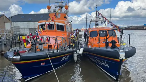 Andrew Turner/BBC Lifeboats at the shore
