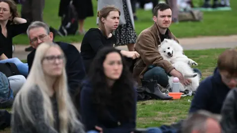 Getty Images People gather in Hyde Park where the State Funeral Service of Britain's Queen Elizabeth II will be shown on a large screen