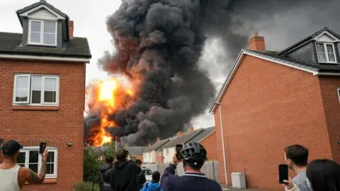 PA Media View of the smoke from the fire