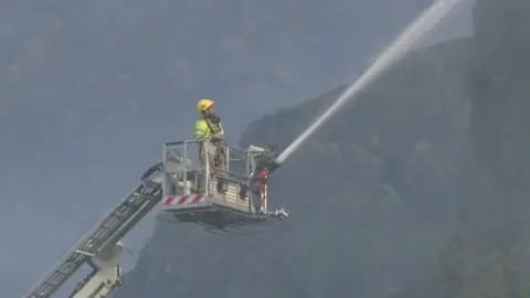 Aerial platform in operation with firefighter at Blaenau Ffestiniog